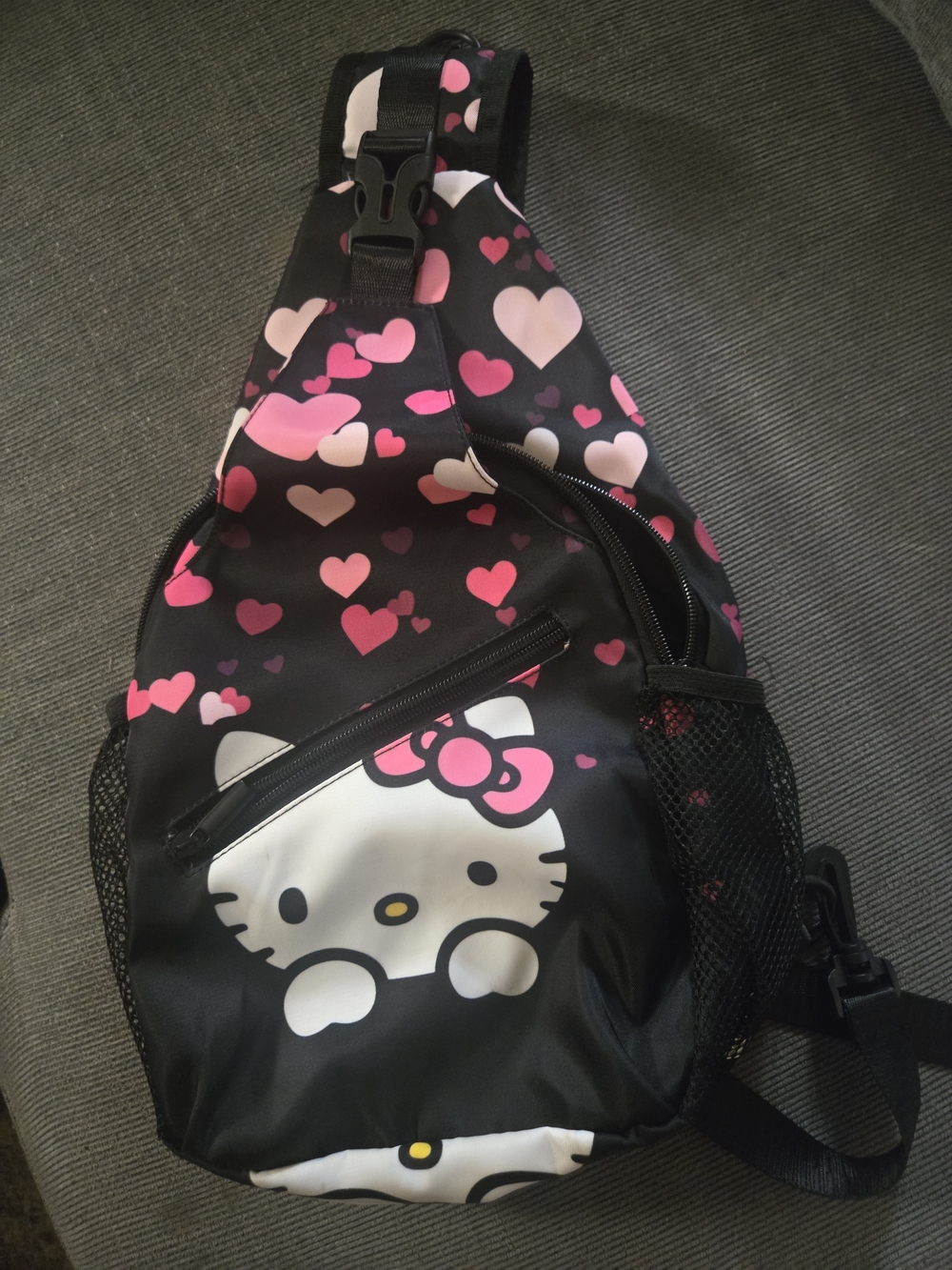 Hello Kitty Black Sling Backpack with Pink Heart Print